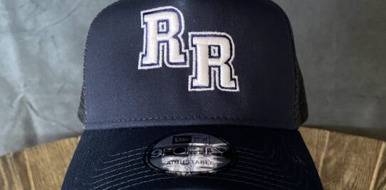 Navy baseball hat custom embroidered with two of the letter R.