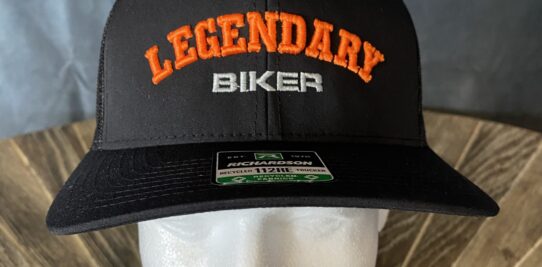 Black baseball hat custom embroidered with the phrase legendary biker.