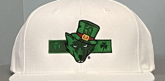 White flat bill hat custom embroidered with a green wolf wearing a green Irish top hat.